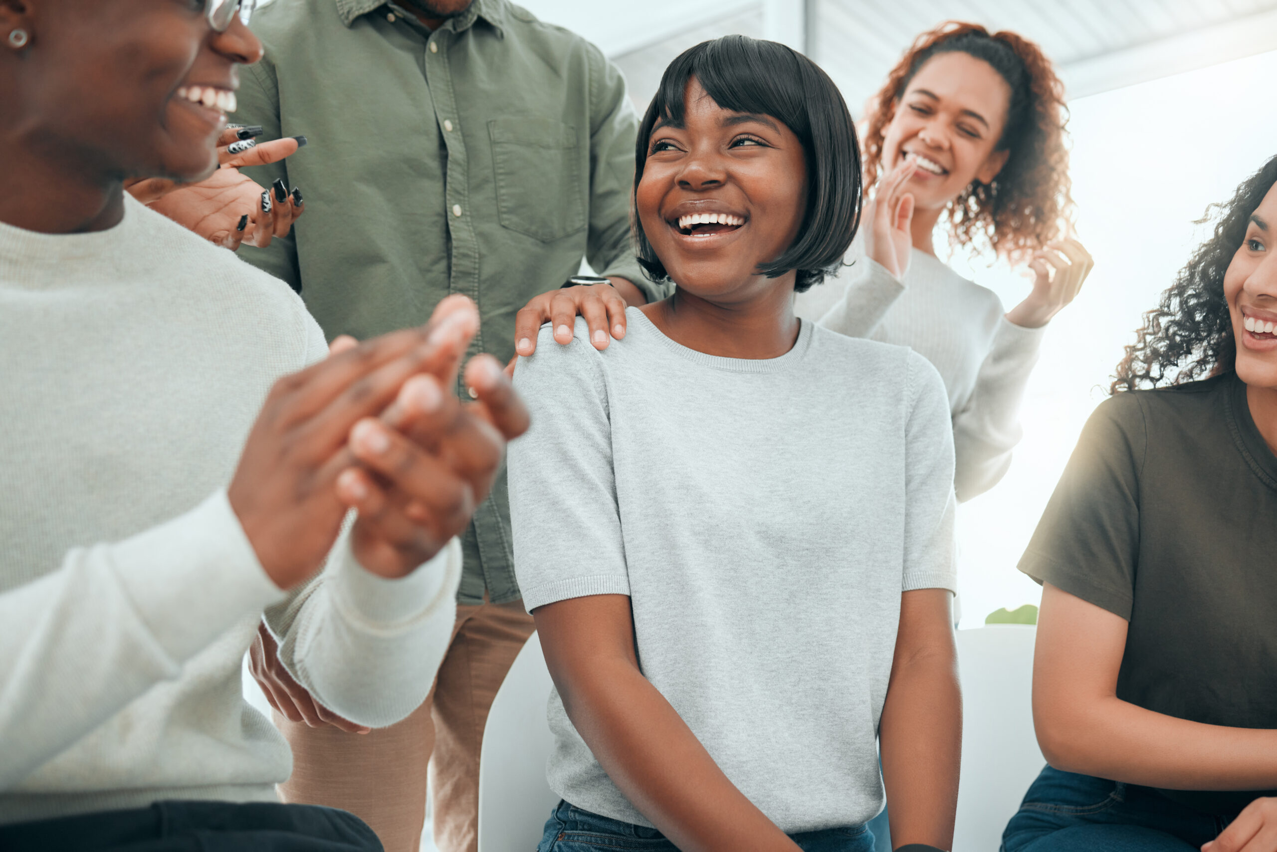 continental-wellness-center-continental-wellness-center-shot-of-an-attractive-young-woman-sitting-with-family-support-group